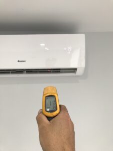 Air conditioner not cooling properly being repaired by Jmax Air specialist in Douglas Park